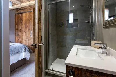 a bathroom with a sink and a shower at Chalet des Amis- Chamonix All Year in Chamonix-Mont-Blanc