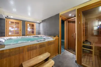 a large bathroom with a jacuzzi tub at Beautiful Nirvana in Megève