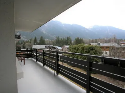 a balcony with a view of a mountain at Charmant T2 Chamonix avec balcon, accepte animaux - FR-1-507-45 in Chamonix-Mont-Blanc