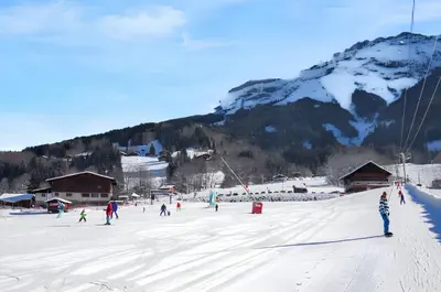 a group of people skiing on a snow covered mountain at Chalet cosy à Sixt-Fer-à-Cheval avec vue sur la montagne in Sixt