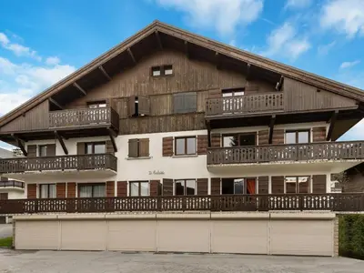 an apartment building with a gambrel roof at Appartement Megève Jaillet, 2 Chambres, Balcon, Parking - FR-1-453-226 in Megève