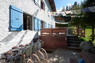 a group of bikes parked outside of a building at Chamonix Lodge in Chamonix-Mont-Blanc