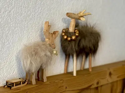 two stuffed animals sitting on top of a shelf at Mont Blanc 43, vue Mont Blanc , balcon, parking in Chamonix-Mont-Blanc