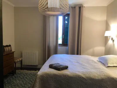 a bedroom with a bed with a towel on it at Nant d Ant in Samoëns