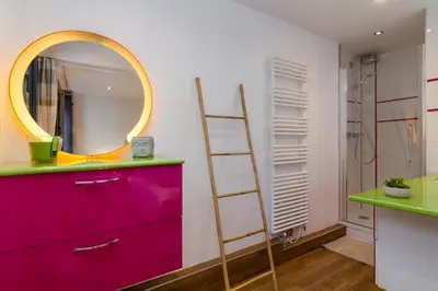 a living room with a couch and a table at Chic 1BR ideally located in the city center in Chamonix-Mont-Blanc