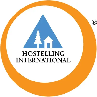 a logo for a hospital implementing international at Auberge de Jeunesse HI Chamonix in Chamonix-Mont-Blanc