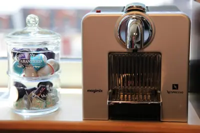 a toaster sitting on a counter next to a jar of candy at ALPINSTAR in Chamonix-Mont-Blanc