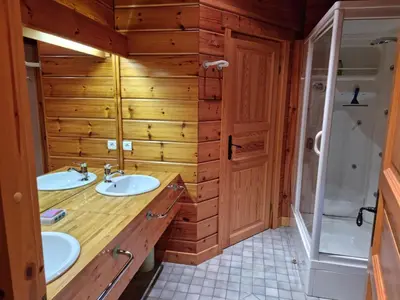 a bathroom with two sinks and a shower at Grand chalet confortable à Demi-Quartier, 13 couchages - FR-1-560-36 in Demi-Quartier