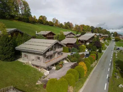 an aerial view of a house with a road at Grand chalet confortable à Demi-Quartier, 13 couchages - FR-1-560-36 in Demi-Quartier