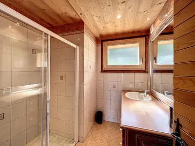 a bathroom with a shower and a sink at Chalet 8 couchages à Combloux, Hiver à la saison, Été à la semaine - FR-1-560-32 in Combloux