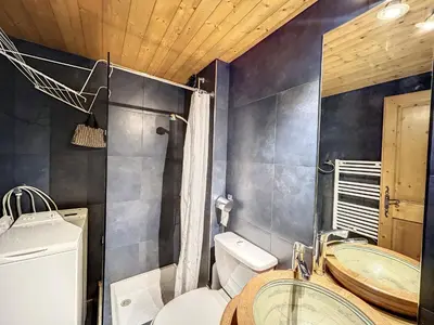 a bathroom with a toilet and a sink at Duplex cosy au pied des pistes de Combloux - FR-1-560-47 in Combloux