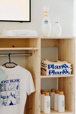 a shelf with a white t shirt on it at PlanB - Living Saint-Gervais - 250m des Remontées Mécaniques in Saint-Gervais-les-Bains