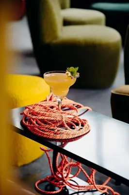 a drink sitting on top of a table at PlanB - Living Saint-Gervais - 250m des Remontées Mécaniques in Saint-Gervais-les-Bains
