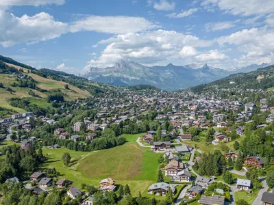 an aerial view of a small town in the mountains at Chalet familial à Megève avec piscine et sauna pour 12 personnes - FR-1-569-2 in Megève