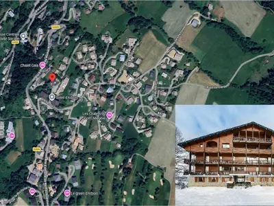 a ski lift going up a snow covered slope at Charmant appartement au Mont d'Arbois proche pistes, parking inclus - FR-1-569-11 in Megève