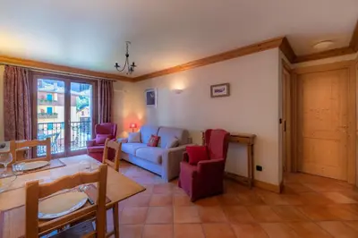 a living room with a couch and a table at DIFY Paccard - Chamonix-Mont-Blanc in Chamonix-Mont-Blanc
