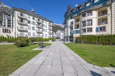 a bench in a park next to some buildings at DIFY Paccard - Chamonix-Mont-Blanc in Chamonix-Mont-Blanc