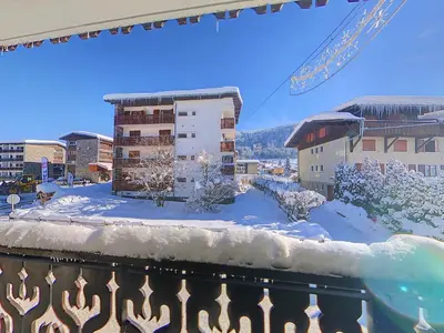 a view of a city in the snow with a gondola at CA116 Studio 4 Pers centre des Carroz in Les Carroz d'Araches