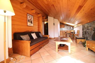 a living room with a couch and a table at Résidence Les Hauts De Chavants - Hauts de Chavants Albert 1er 13 MAE-6404 in Les Houches