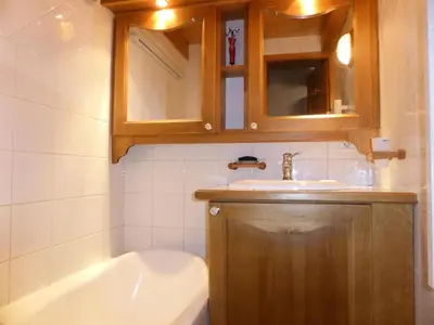 a bathroom with a sink and a bath tub at Résidence Les Hauts De Chavants - Hauts de Chavants Albert 1er 13 MAE-6404 in Les Houches