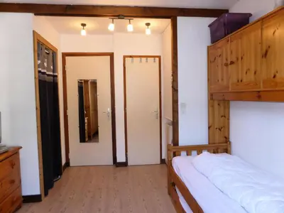 a bedroom with a bunk bed and a mirror at Résidence Aiguille Du Midi Bat A - Aiguille du Midi A778 MAE-6406 in Les Houches