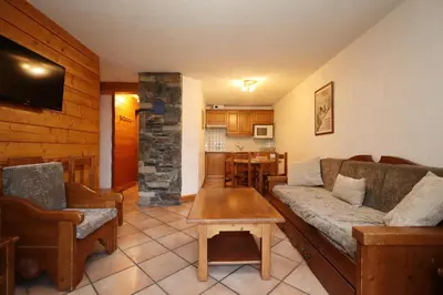a living room with a couch and a table at Résidence Les Hauts De Chavants - Hauts de Chavants Berard 10 MAE-6415 in Les Houches