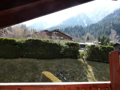 a view from a window of a house in the mountains at Chalets Alpages - Chalets Alpages 4 MAE-6417 in Les Houches