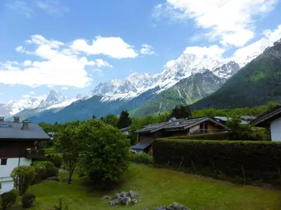 a view of a mountain range with houses at Résidence Les Aiguilles Rouges Bat B - Aiguilles Rouges B6 MAE-6418 in Les Houches