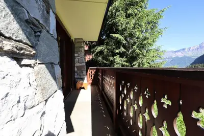 a balcony of a house with a fence at Résidence Les Hauts De Chavants - Hauts de Chavants Berard 01 MAE-6419 in Les Houches