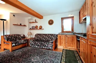 a living room with a couch and a table at Résidence Beauregard - Beauregard 6 MAE-6421 in Les Houches