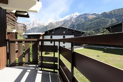 a balcony with a view of the mountains at Résidence Le Prarion 2 C - Prarion 2 C13 MAE-6430 in Les Houches