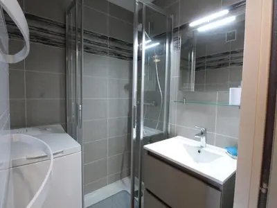 a bathroom with a sink and a shower at Studio chaleureux 4 pers, centre village, proche pistes et commerces, balcon sud-ouest - FR-1-572-105 in Les Carroz d'Araches