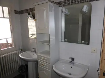 a white bathroom with a sink and a mirror at Chalet Pylone - Chalet Pylone MAE-5198 in Saint-Gervais-les-Bains