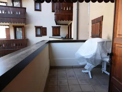 a kitchen with a counter top in a building at Résidence Les Jardins Alpins - Jardins Alpins B03 MAE-5231 in Saint-Gervais-les-Bains