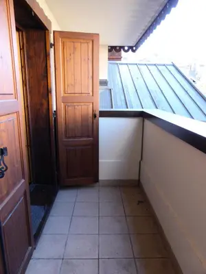 an empty room with a door and a tiled floor at Résidence Les Jardins Alpins - Jardins Alpins B03 MAE-5231 in Saint-Gervais-les-Bains