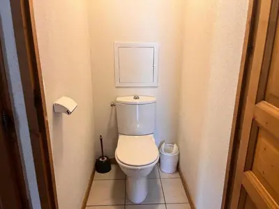 a bathroom with a toilet in a small room at Résidence Le Grand Panorama - Grand Panorama 104 MAE-5255 in Saint-Gervais-les-Bains