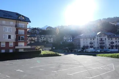 a parking lot in front of some buildings at Résidence Le Grand Panorama - Grand Panorama 104 MAE-5255 in Saint-Gervais-les-Bains