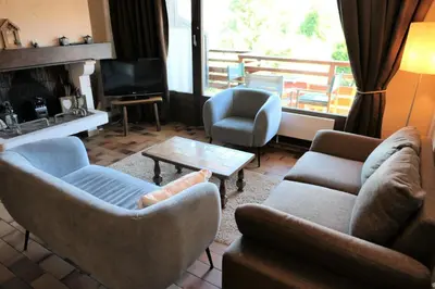 a living room with couches and chairs and a television at Résidence La Gelinotte - Gelinotte 04 MAE-5260 in Saint-Gervais-les-Bains
