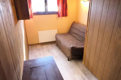 a small room with a bed and a window at Résidence La Gelinotte - Gelinotte 04 MAE-5260 in Saint-Gervais-les-Bains