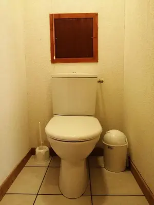 a small bathroom with a toilet and a window at Résidence Le Grand Panorama - Grand Panorama 211 MAE-5265 in Saint-Gervais-les-Bains