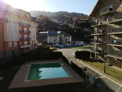 a swimming pool in the middle of a building at Résidence Le Grand Panorama - Grand Panorama 211 MAE-5265 in Saint-Gervais-les-Bains