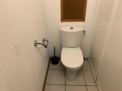 a bathroom with a white toilet in a stall at Résidence Le Grand Panorama - Grand Panorama 401 MAE-5268 in Saint-Gervais-les-Bains