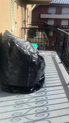 a black tarp on a sidewalk next to a building at Résidence Le Grand Panorama - Grand Panorama 411 MAE-5270 in Saint-Gervais-les-Bains