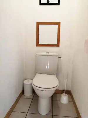 a white toilet in a bathroom with a mirror at Résidence Le Grand Panorama - Grand Panorama 411 MAE-5270 in Saint-Gervais-les-Bains