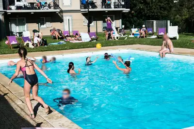 a group of people playing in a swimming pool at Résidence Le Grand Panorama - Grand Panorama 102 MAE-5295 in Saint-Gervais-les-Bains