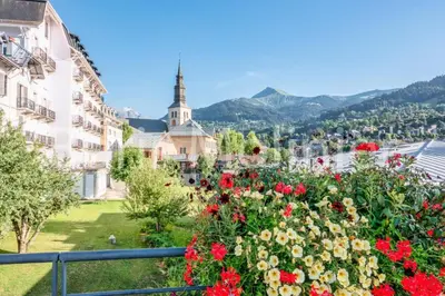 a view of the city of lucerne with flowers at Résidence Le Grand Panorama - Grand Panorama 102 MAE-5295 in Saint-Gervais-les-Bains