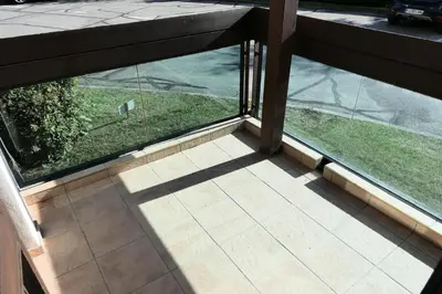 a view of a balcony with a view of a yard at Résidence Castel Des Roches C - Castel des Roches R5B MAE-5296 in Saint-Gervais-les-Bains