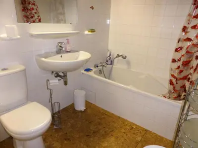 a bathroom with a toilet and a sink and a tub at Résidence Bionnassay - Bionnassay B181 MAE-5332 in Les Contamines-Montjoie