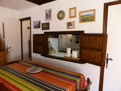 a bedroom with a bed with a mirror on the wall at Résidence Bionnassay - Bionnassay B181 MAE-5332 in Les Contamines-Montjoie