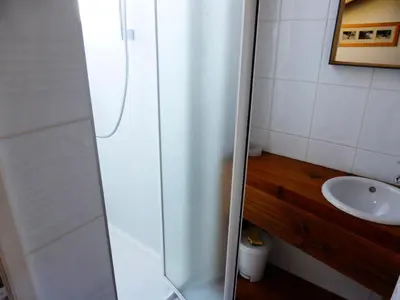 a bathroom with a shower and a sink at Chalet Champelet - Chalet Champelet MAE-5333 in Les Contamines-Montjoie